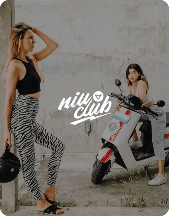 Niu Club campaign visual with a rider, Niu Mobility Bali